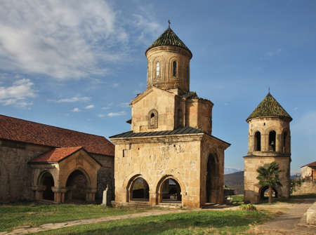 Church of St. Nicholas and bell tower at Gelati Monastery of Theotokos near Kutaisi. Imereti Province. Georgiaの写真素材