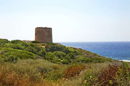 Nuraghe - ancient megalithic edifice in Isola Rossa village. Sardinia. Italyの写真素材