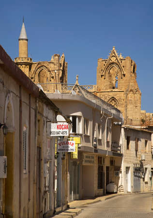 Typical street and Lala Mustafa Pasha Mosque - Cathedral of Saint Nicholas in Famagusta. Cyprusのeditorial素材