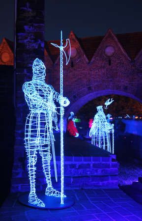 Festival of light. Historical figures at Torun castle. Polandのeditorial素材