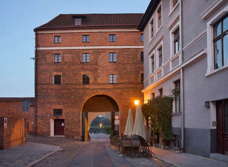 Monastery gate (Brama Klasztorna) at Holy Spirit street in Torun. Polandのeditorial素材