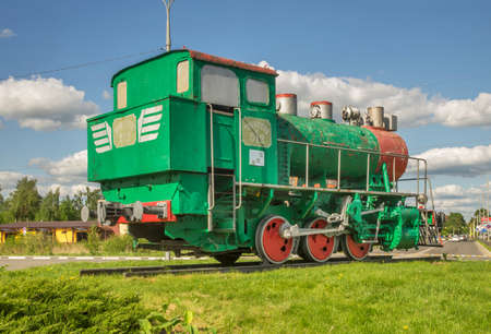 Old locomotive in front of Bolshaya Volga railway station 9P512 in Dubna. Russiaのeditorial素材