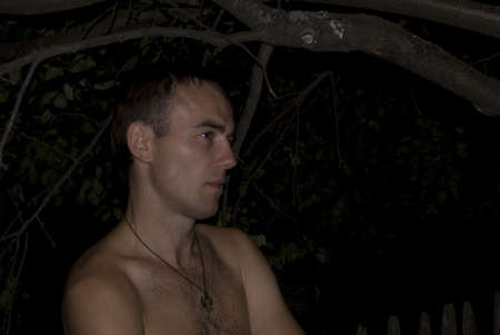 young man with naked chestの写真素材