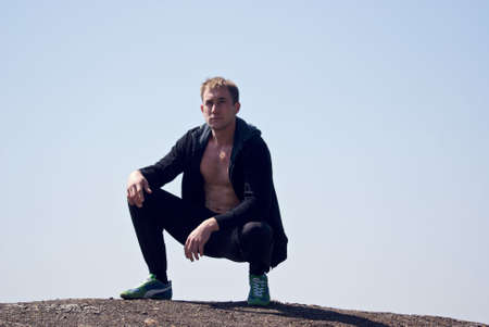 young man with naked chestの写真素材