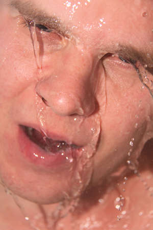 guy washing face