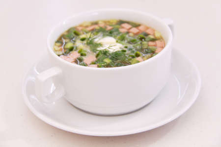 ssian kvass soup with chopped vegetables and meat isolated on white の写真素材