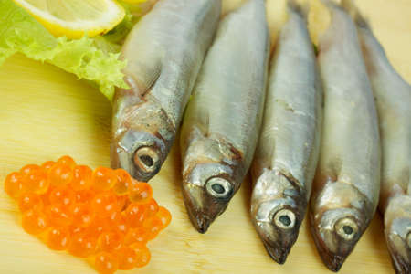 some smelts isolated on white backgroundの写真素材