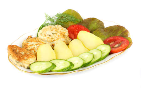 Grilled steak with vegetables on the white backgroundの写真素材