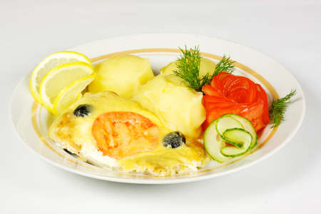 Ham and potato gratin on the whiteの写真素材