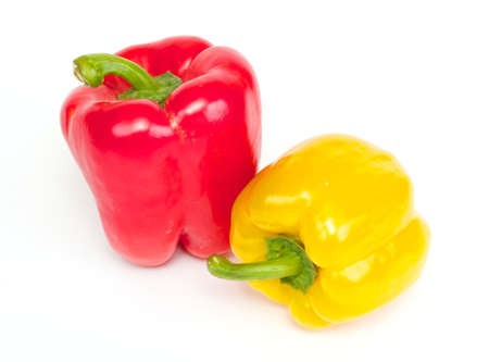 Red and yellow pepper are isolated on a white backgroundの写真素材