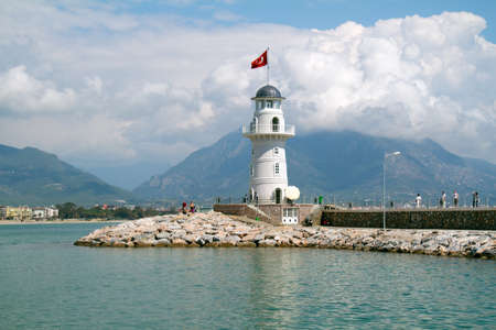Lighthouse in port. Turkey, Alanya. Sunny weatherの写真素材