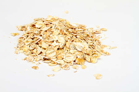 Oat flakes on white backgroundの写真素材