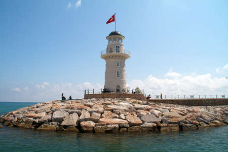 Lighthouse in port. Turkey, Alanya. Sunny weatherの写真素材