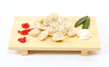 Meat Dumplings - russian pelmeni - with laurelの写真素材