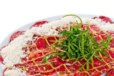 Meat (beef) Carpaccio with Parmesan Cheese and ruccolaの写真素材