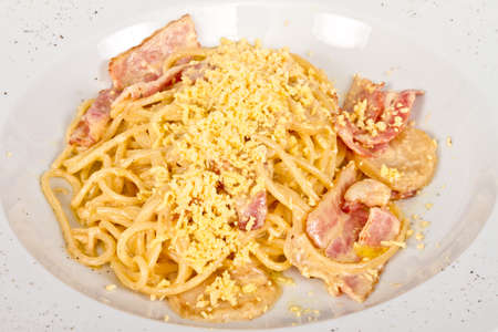 spaghetti carbonara pasta with bacon and mushroomsの写真素材