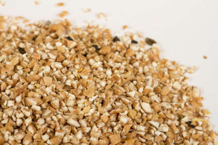 Pearl barley heap isolated on whiteの写真素材
