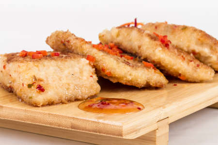 Fried fish fillets with  salad.の写真素材