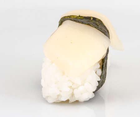sushi hotate with slice of scallop isolated on white backgroundの写真素材