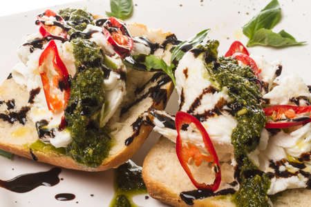 Fresh toast sandwiches with cheese and basilic and pestoの写真素材