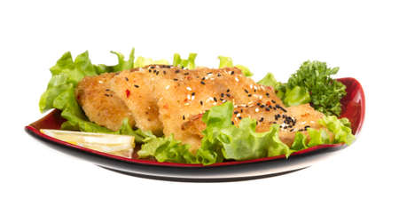 Roasted fish with lemonの写真素材