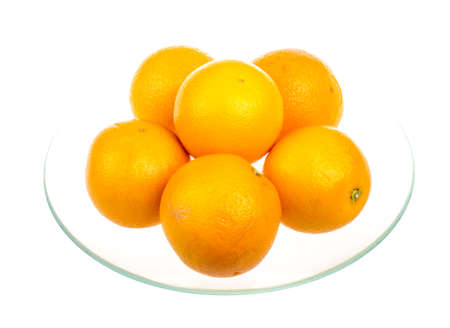 Heap of oranges in the dishの写真素材