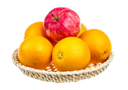 oranges and juicy apple isolated on white backgroundの写真素材