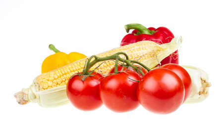 pepper, ripe yellow corn and tomatoの写真素材