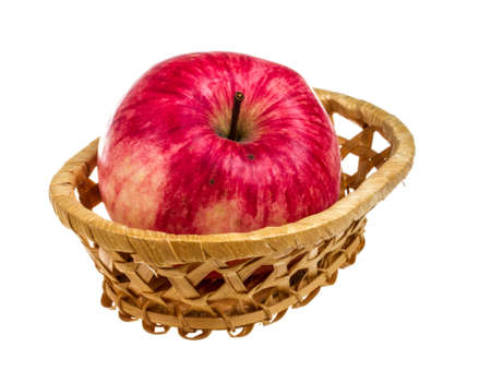 fresh red apples in the dish isolated on white backgroundの写真素材