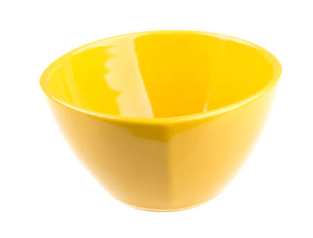 Empty yellow plateの写真素材