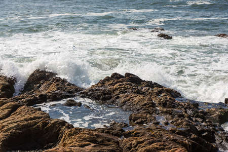 waves crashing over Portuguese Coastの写真素材