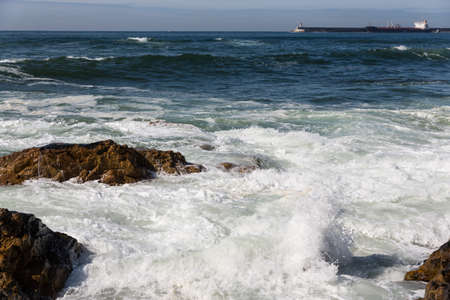 waves crashing over Portuguese Coastの写真素材