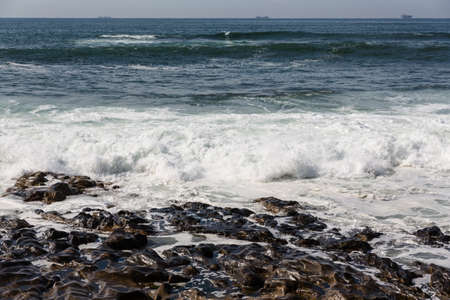 waves crashing over Portuguese Coastの写真素材