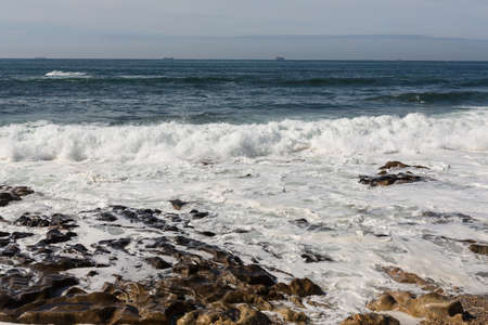 waves crashing over Portuguese Coastの写真素材