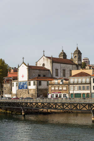 View of Porto city at the riverbank (Ribeira quarter) and wine boats(Rabelo) on River Douro(Portugal), a UNESCO World Heritage City.の写真素材