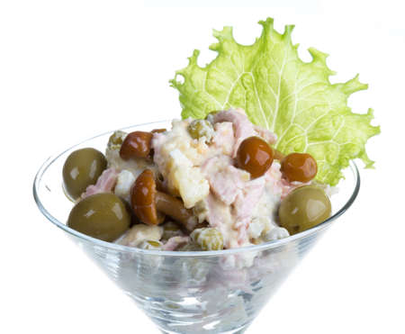 Russian salad Olivier with mushroomの写真素材