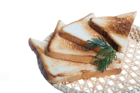 toasted bread slices for breakfast isolated on white studio background.の写真素材