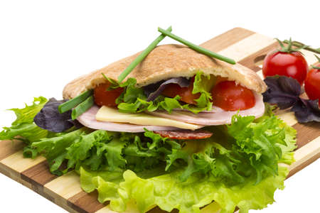 Bread with sausages and saladの写真素材