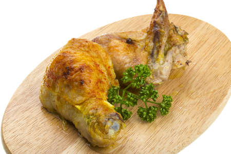 Roasted chicken with parsley and carryの写真素材