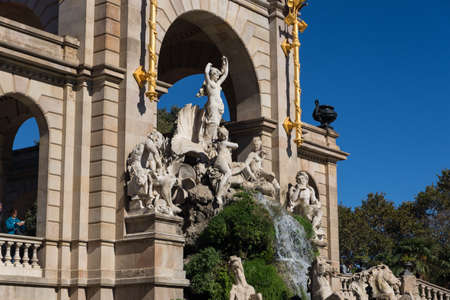 Barcelona ciudadela park lake fountain with golden quadriga of Auroraの写真素材