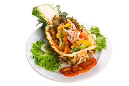 Seafood salad served in pineappleの写真素材