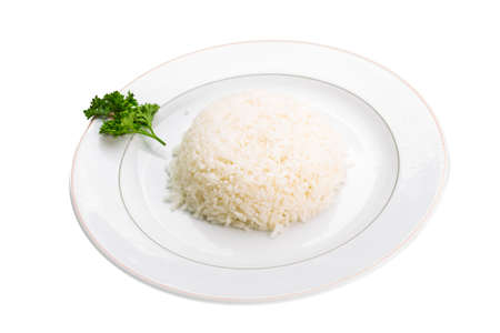 Boiled Rice with parsley branch isolatedの写真素材