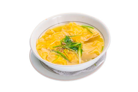 Won-ton Yellow Chinese soup with onionの写真素材