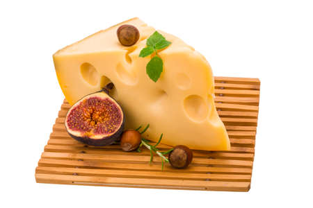 Maasdam cheese with fig and herbsの写真素材