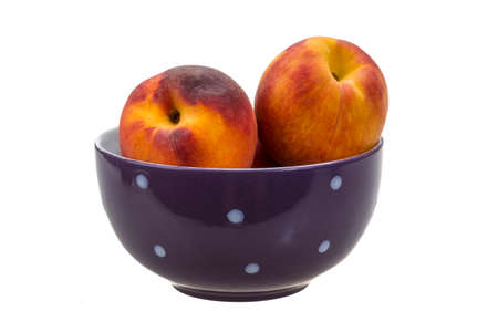 Bright ripe peaches isolatedの写真素材