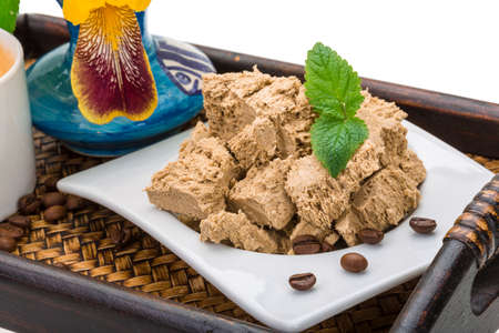 Coffee with Sunflower Halva served Iris flower
