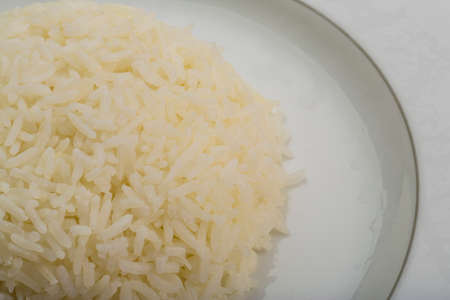 Boiled Rice with parsley branch isolatedの写真素材
