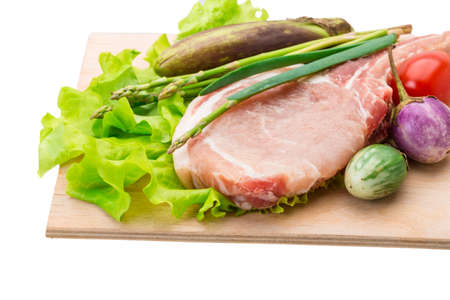 Raw t-bone steak with asparagus and egg-plantの写真素材