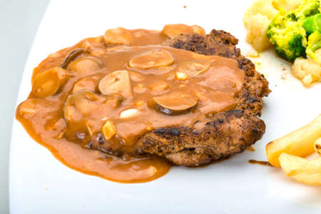 Beef steak with mushroom sauceの写真素材