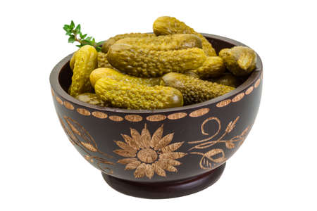 Small Marinated cucumbers in the bowl isolatedの写真素材